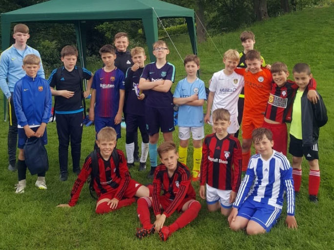 Half-term football camp provides quality coaching for Holmfirth Town players